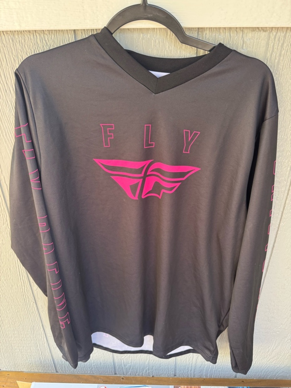 FLY Women's Long Sleeve Graphic Top in Black with Pink Logo